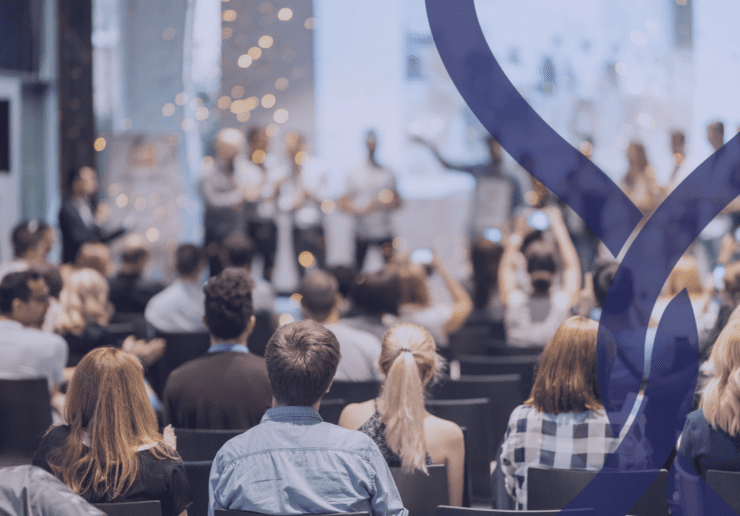 An awards ceremony with glitter in the air